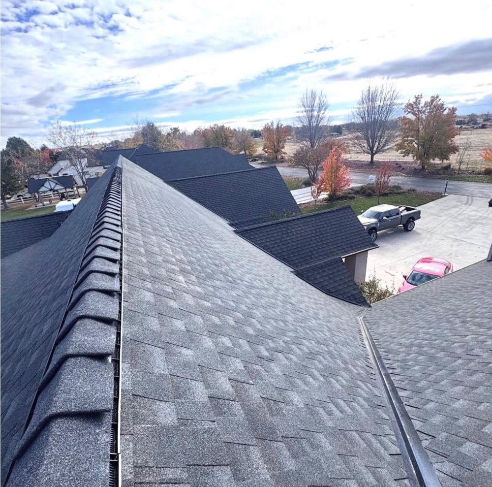 Shingle roof replacement with ridge vent by Hawks Roofing