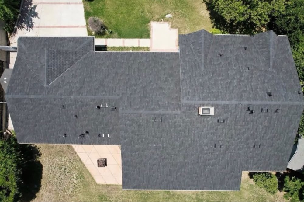 Completed shingle roof, top-down drone view by Hawks Roofing