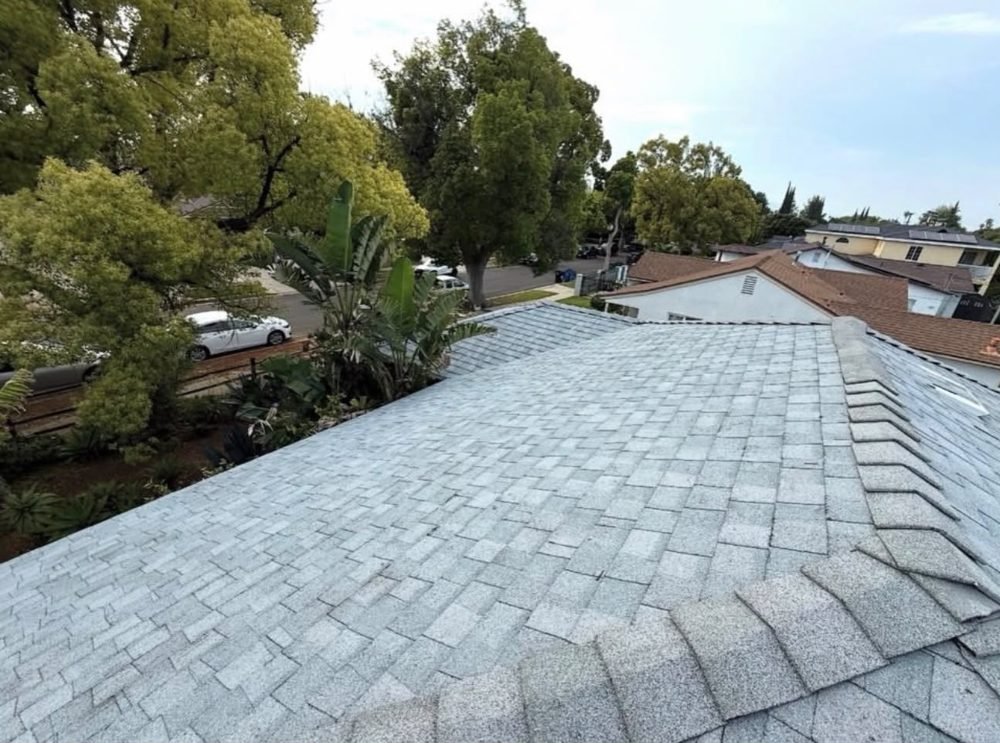 New light gray shingle roof by Hawks Roofing