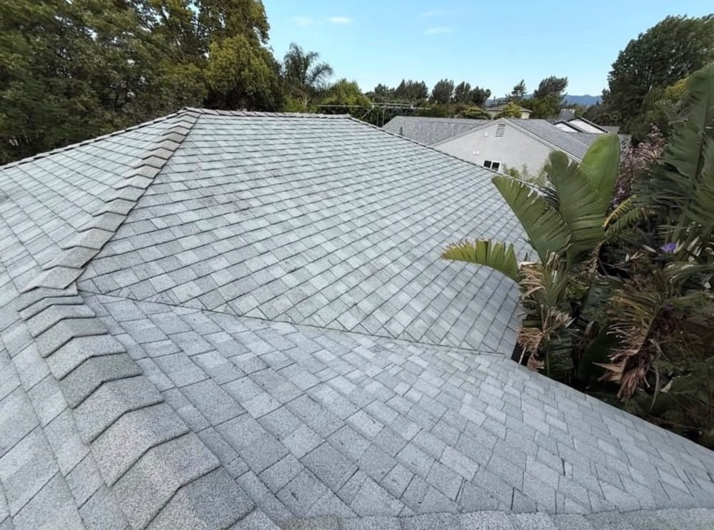 Light gray architectural shingle roof by Hawks Roofing